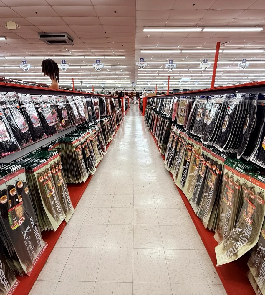 Braiding hair aisle inside The Hair Depot Supercenter