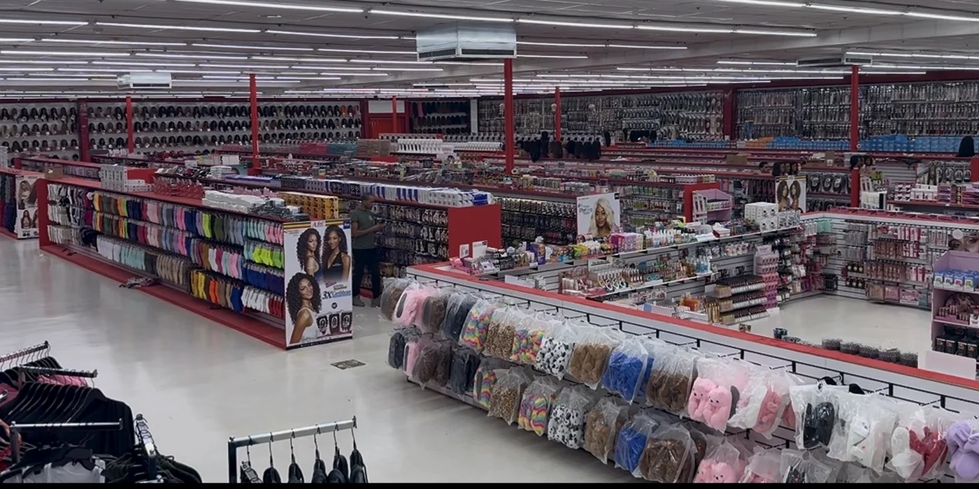 Wide interior view of The Hair Depot Supercenter